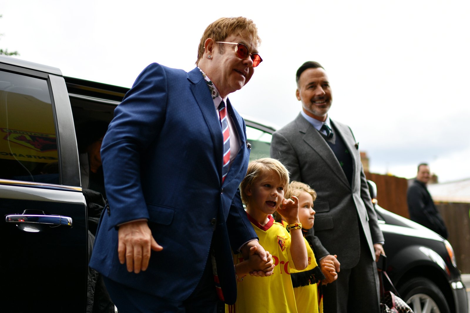 Sir Elton John and David Furnish with their sons Elijah and Zachary in England in 2011 | Source: Getty Imagesin