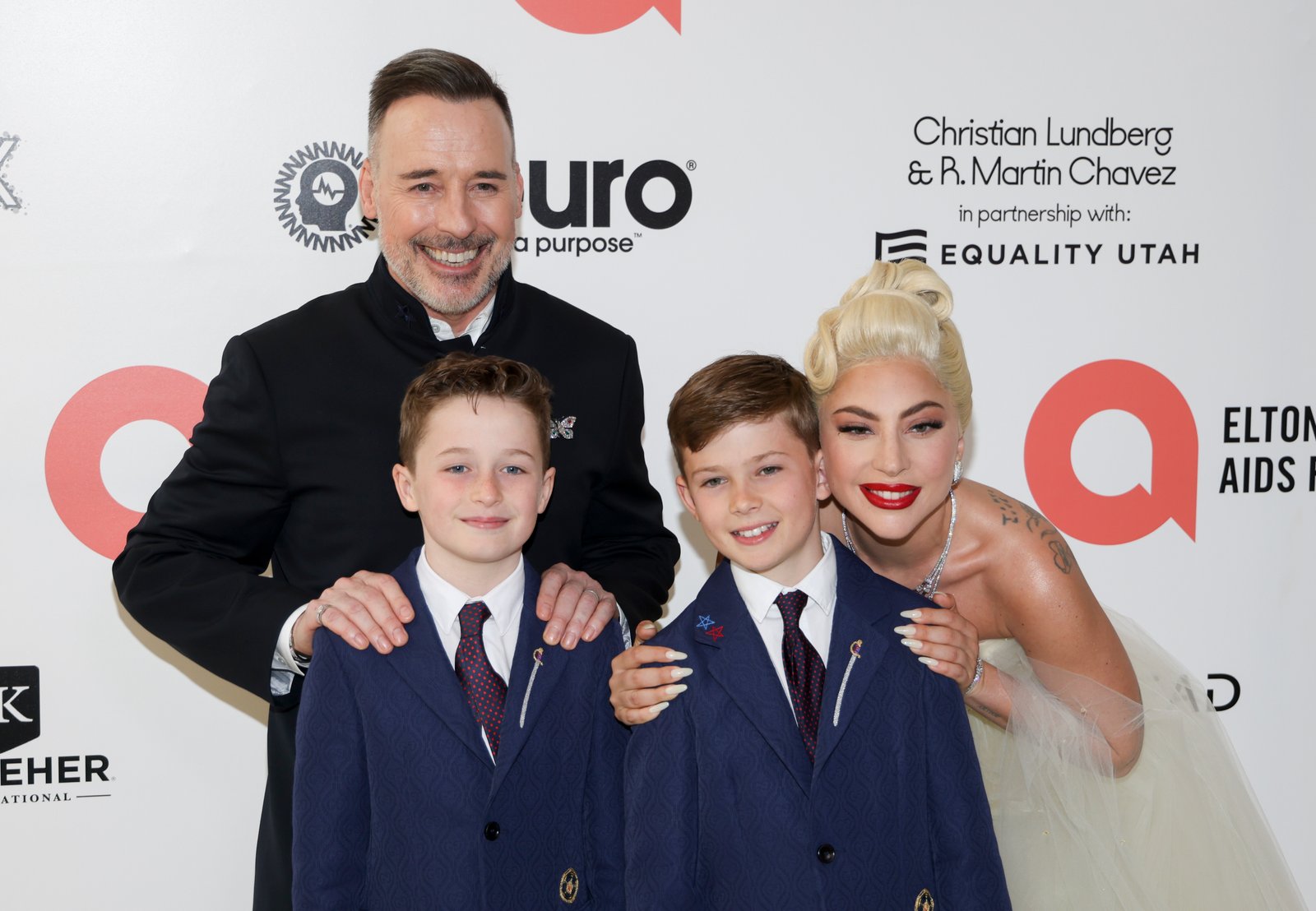 Lady Gaga with David Furnish and his sons Zachary and  Elijah in California in 2022 | Source: Getty Images
